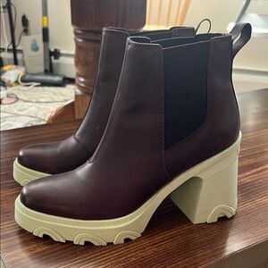 Sorel Dark Brown Heeled Boots with turquoise Sole